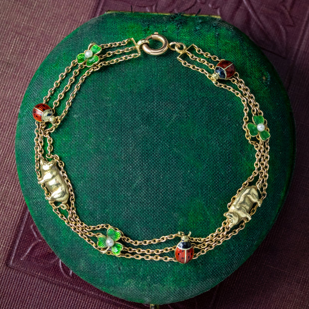 Antique Edwardian Bracelet With Lady Birds Pigs And Pearl Enamel Shamrocks
