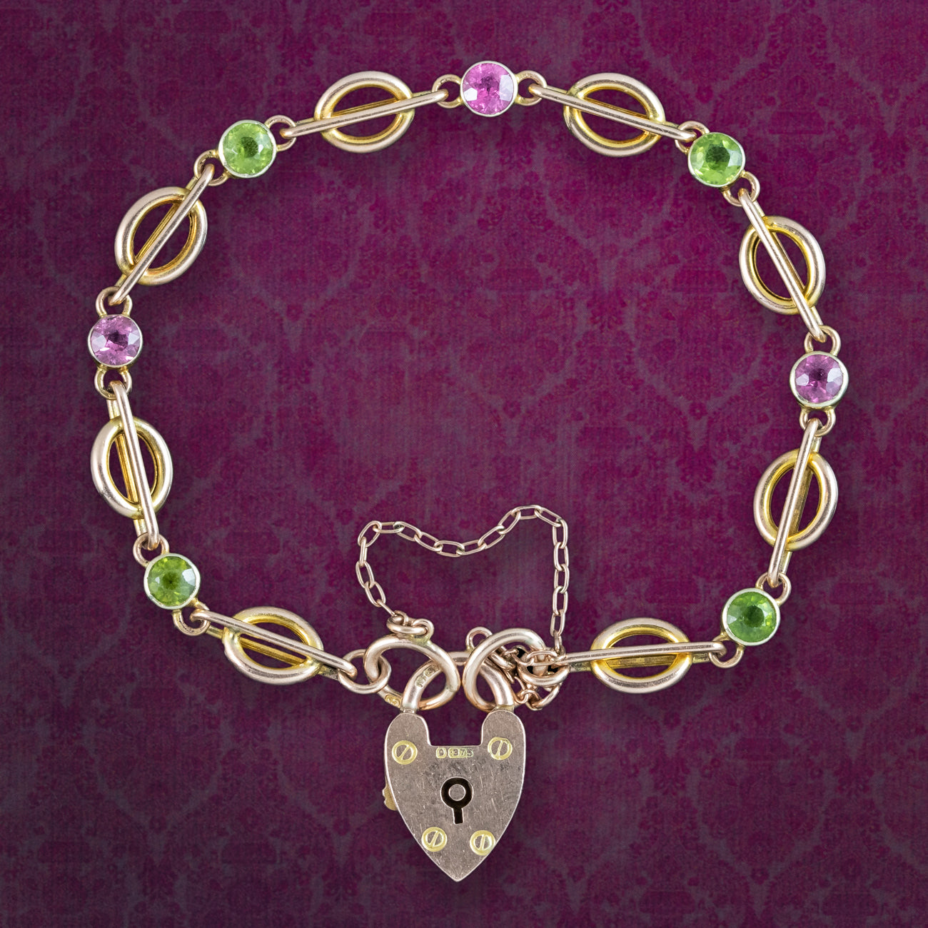 An Edwardian peridot and tourmaline pendant