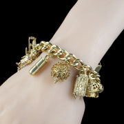 Vintage Curb Gate Bracelet With Seventeen Charms Silver Gilt