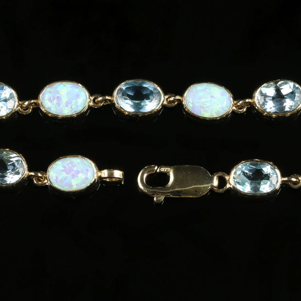 Blue Topaz And Opal Bracelet 9Ct Gold