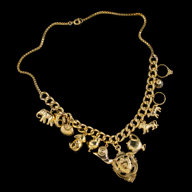 Vintage Gold Charm Necklace 9Ct Gold 12 Charms And Medallion Dated 1920