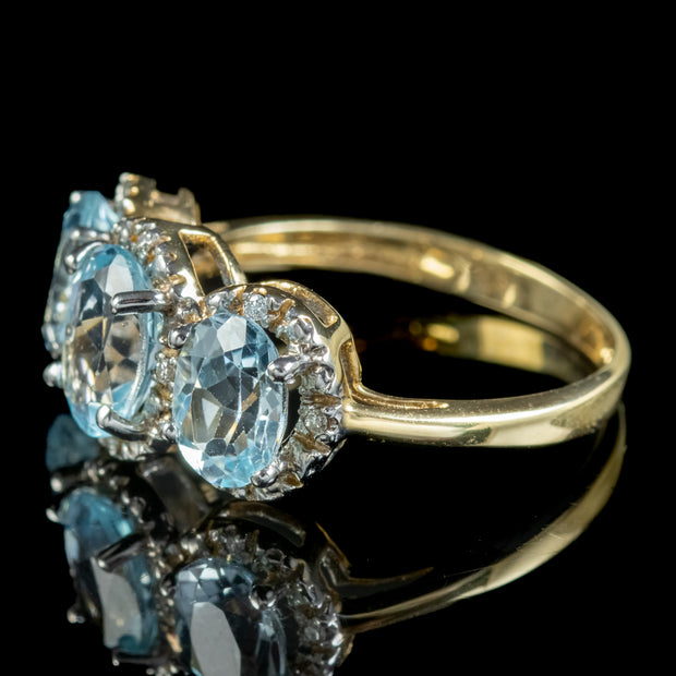 Victorian-Style-Blue-Topaz-Diamond-Trilogy-Gold-Ring-