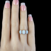Victorian Style Opal Diamond Trilogy Ring hand