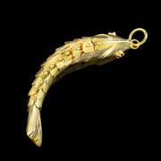 Vintage Articulated Fish Pendant 14ct Gold Garnet Eyes top